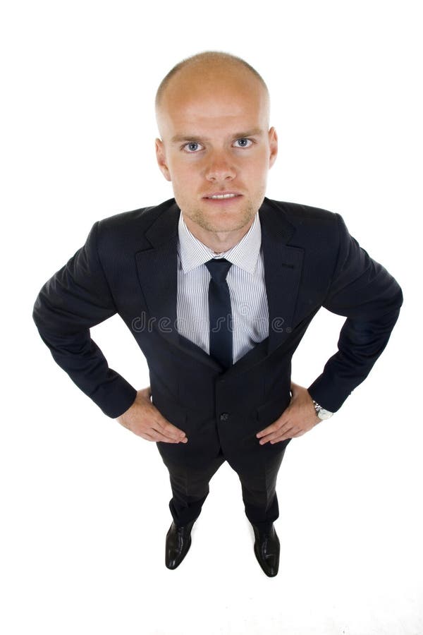 Businessman in suit stands with confidence