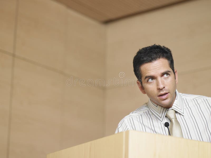 Businessman Talking Into Microphone royalty free stock photo
