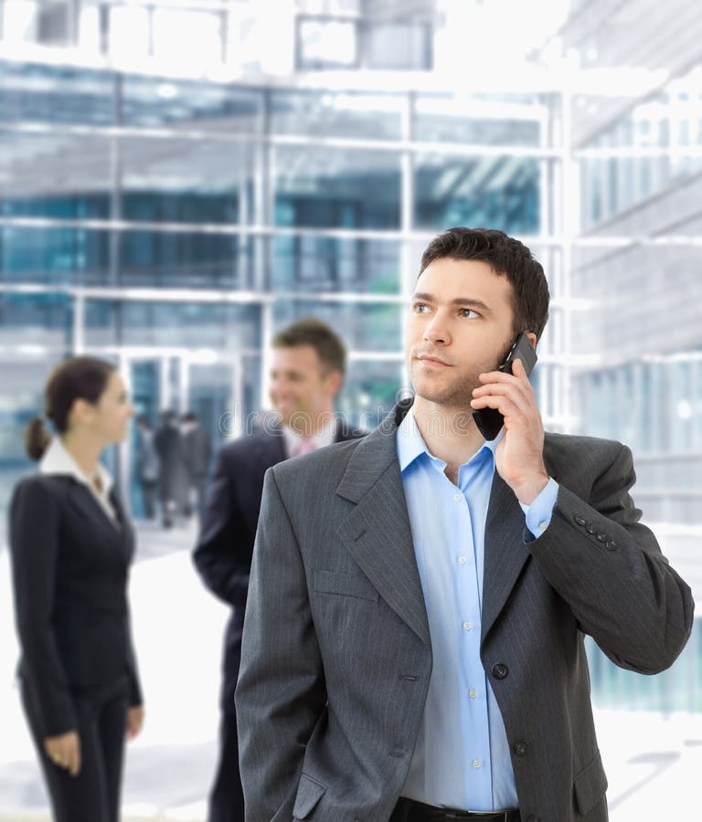 Businessman talking on mobile royalty free stock photo