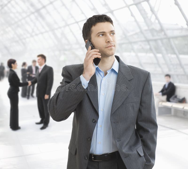 Businessman talking on mobile stock photos
