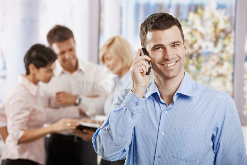 Businessman talking on mobile stock images