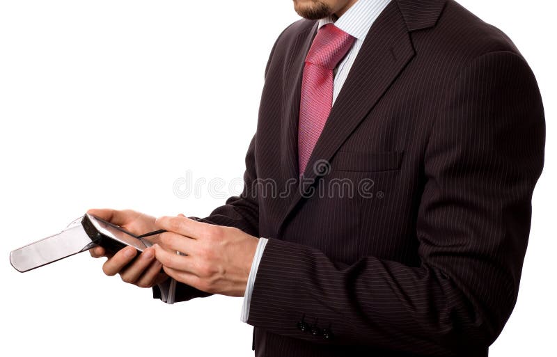 Businessman tapping on a pda stock photo