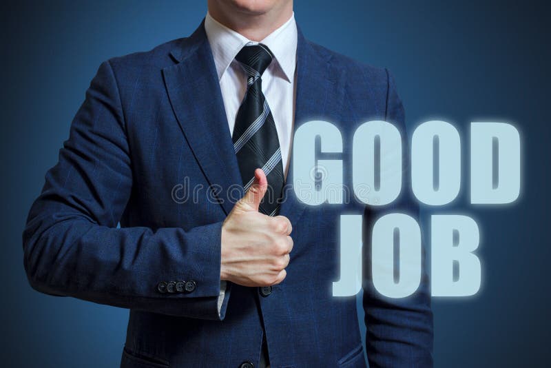 Businessman thumbs up with Good job text. Businessman showing thumbs up for the phrase Good Job stock photo