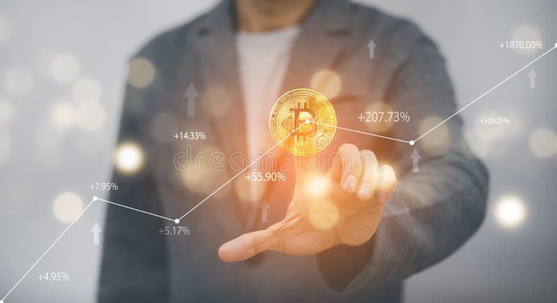 Businessman is touch a bitcoin as part of a business network on blue background. bitcoin cryptocurrency ideas concept and virtual