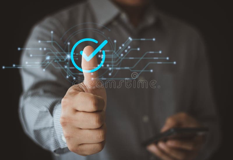 Businessman touching check icon to approve on virtual screen. service guarantee, Validation concept royalty free stock image