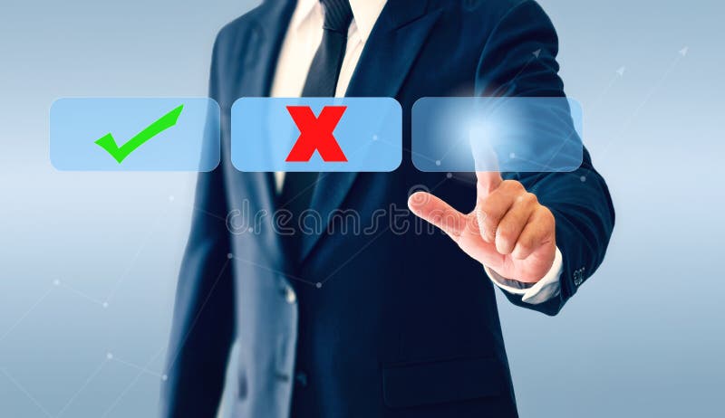 Businessman touching check marks virtual button. Concept of business decision may be right or wrong stock photography