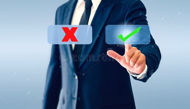 Businessman touching check marks virtual button. Symbol mark and wrong. royalty free stock images