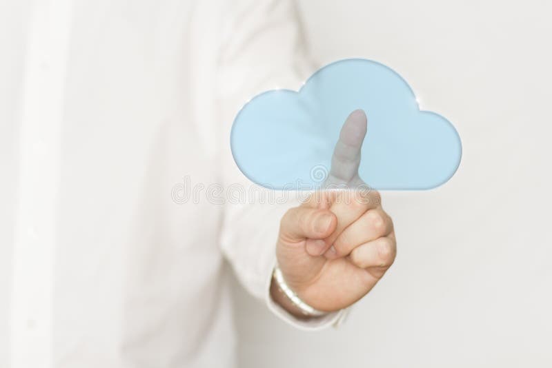 Cloud computing concept. Businessman touching cloud computing icon as a symbol of mobile access to data