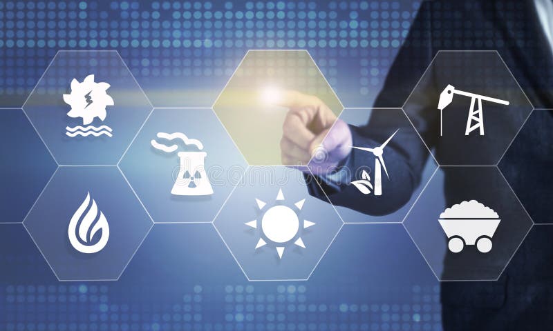 Businessman touching the screen about energy source royalty free stock photo