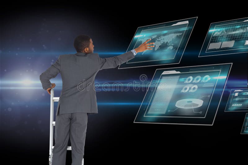 Businessman touching tablet computer screen from the top of the ladder against space background stock photo