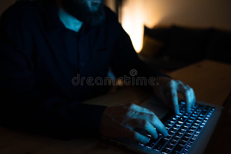 Businessman Typing Recent Updates on Lap Top Keyboard on Desk. Man in