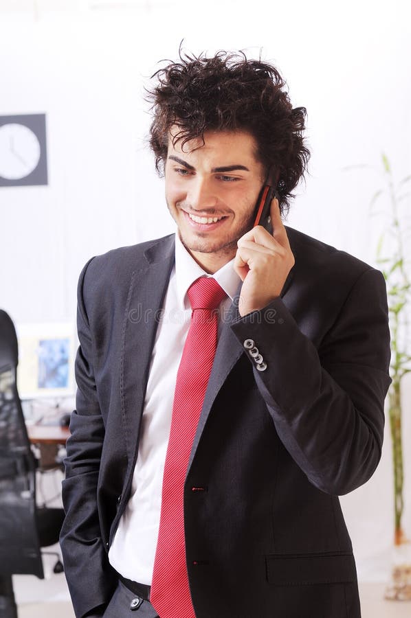 Businessman uses telephon