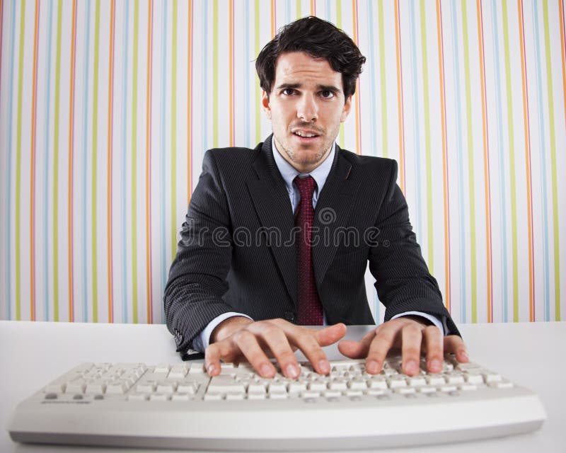 Businessman using his computer stock image Businessman using his computer stock image