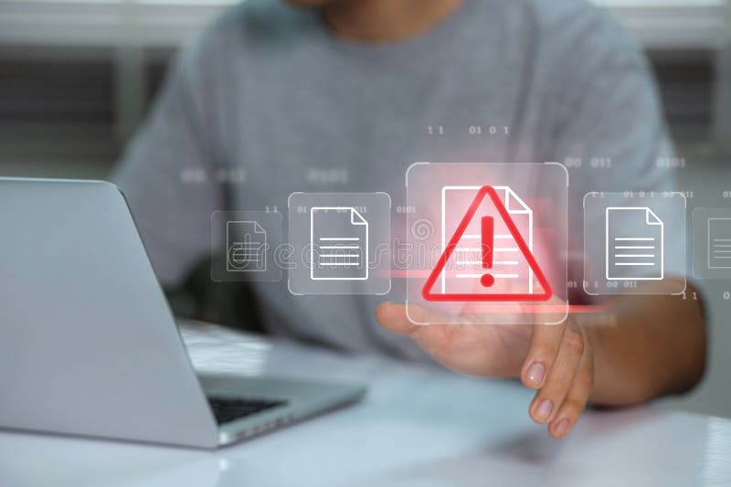 Businessman using laptop with data information privacy and document management hacking and spam warning symbol. cyber attack royalty free stock images