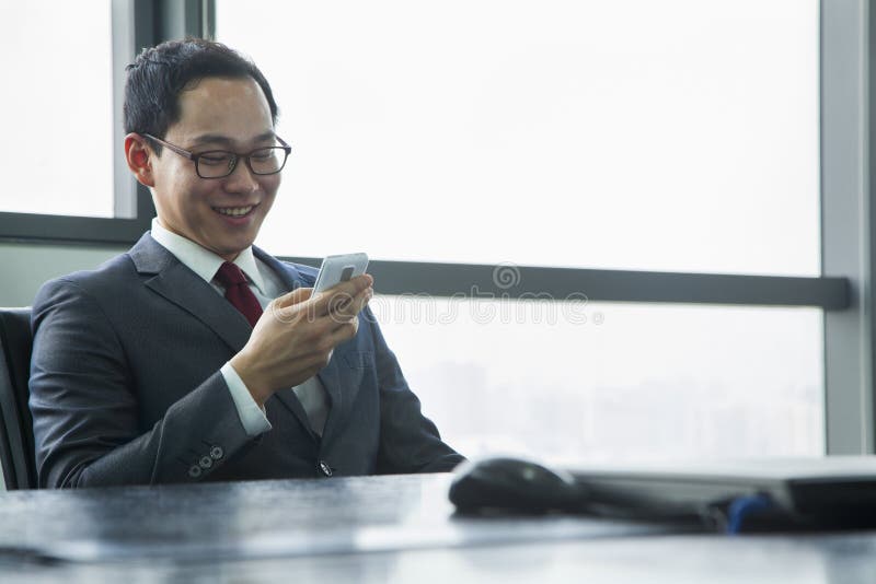 Businessman Using Mobile Phone royalty free stock photo