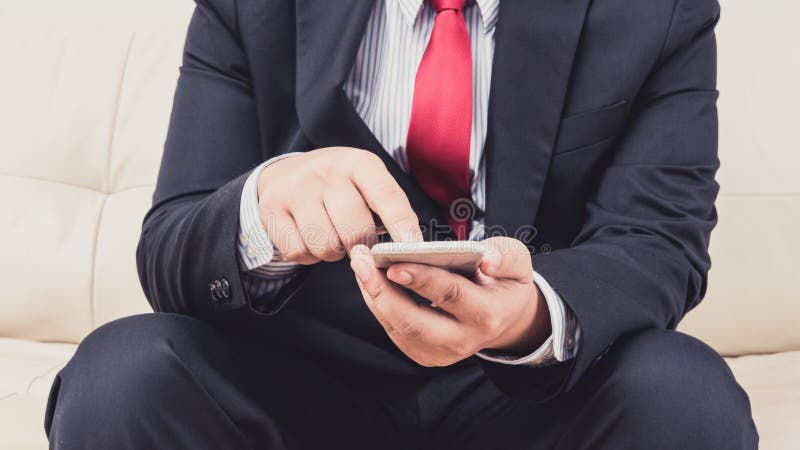 Businessman using mobile smartphone royalty free stock photos