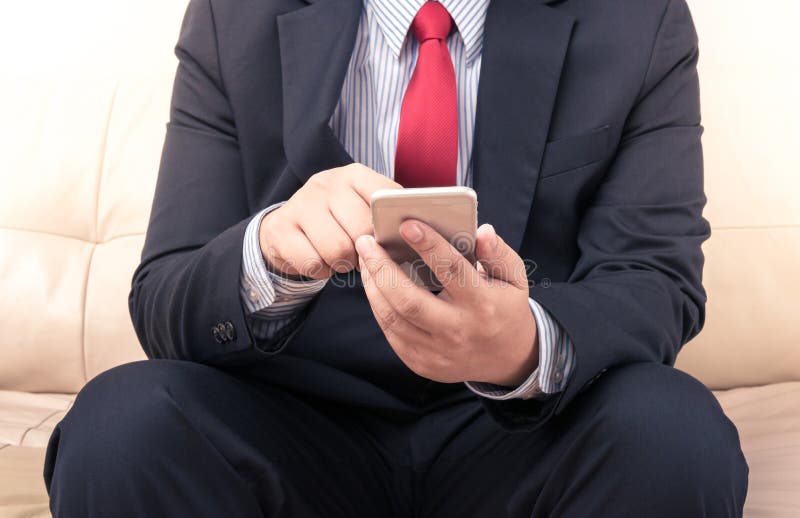 Businessman using mobile smartphone stock photos