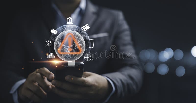 Businessman using smartphone with red triangle caution warning sign for notification error from hacker malware and need royalty free stock image