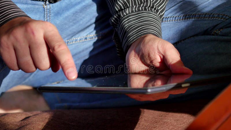 businessman-is-using-tablet-computer-fro-online-shopping-stock-image