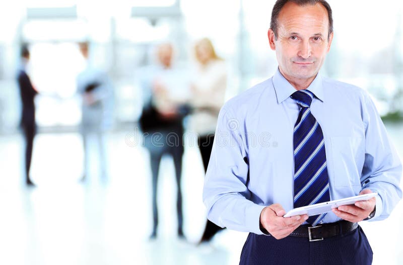 Businessman using tablet computer