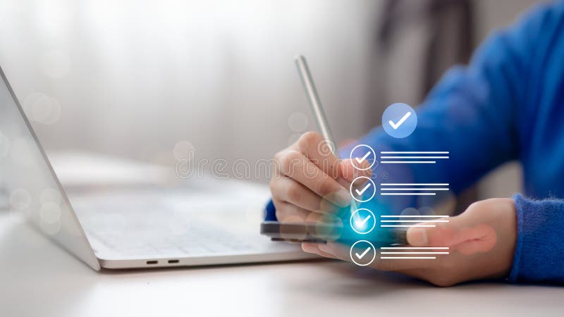 Businessman using tablet and laptop Online survey filling out, digital form checklist, Business performance monitoring concept royalty free stock photography