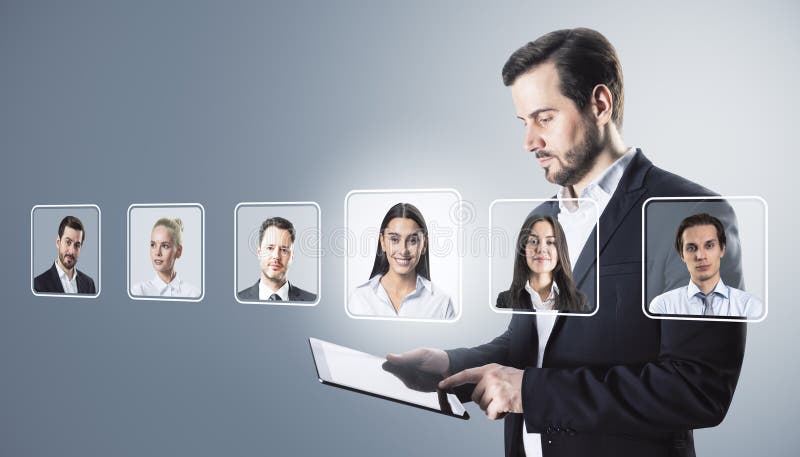 Businessman using tablet to select digital profiles of diverse workers on light background for online management or recruitment stock images