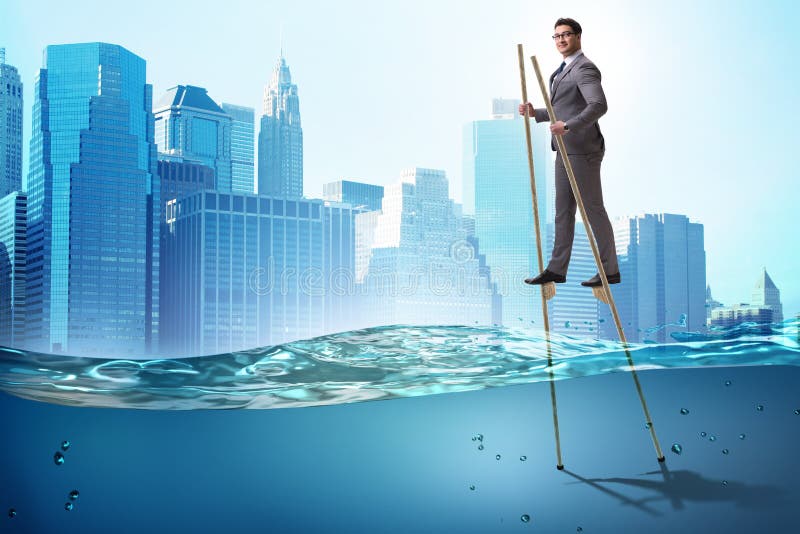 The Businessman Walking on Stilts in Water Sea Stock Photo Image of