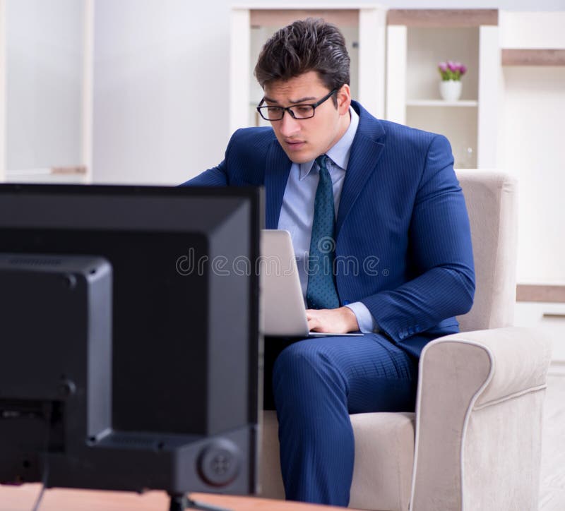Businessman Watching Tv in the Office Stock Image Image of channels