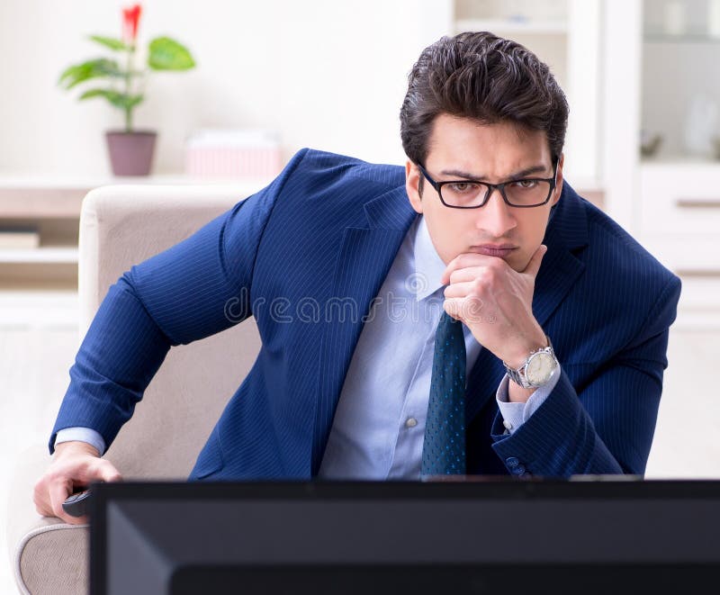 Businessman Watching Tv in the Office Stock Photo Image of living
