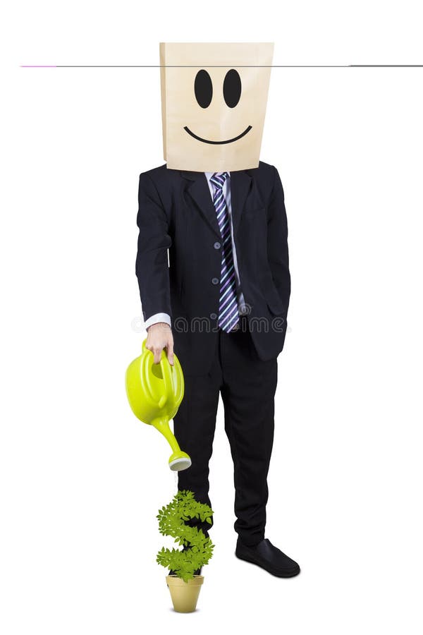 Businessman is watering money plant royalty free stock photography Businessman is watering money plant royalty free stock photography