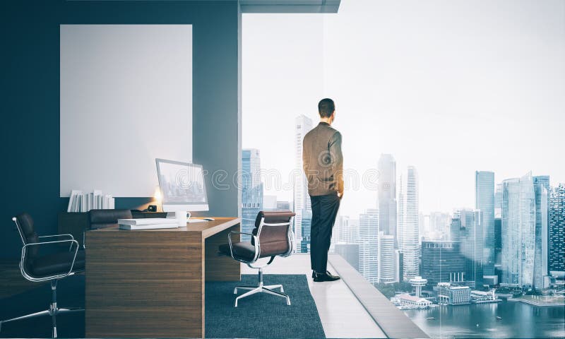 Businessman wearing modern suit and looking at the royalty free stock image Businessman wearing modern suit and looking at the royalty free stock image