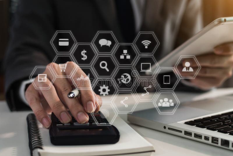 Businessman working on calculator to calculate financial data report, accountancy document and laptop computer at office. stock photos Businessman working on calculator to calculate financial data report, accountancy document and laptop computer at office. stock photos