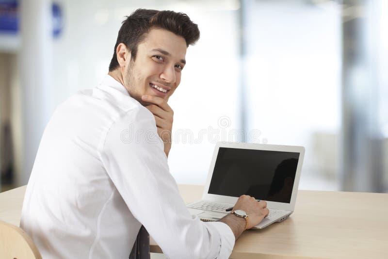 Businessman working computer in office royalty free stock image