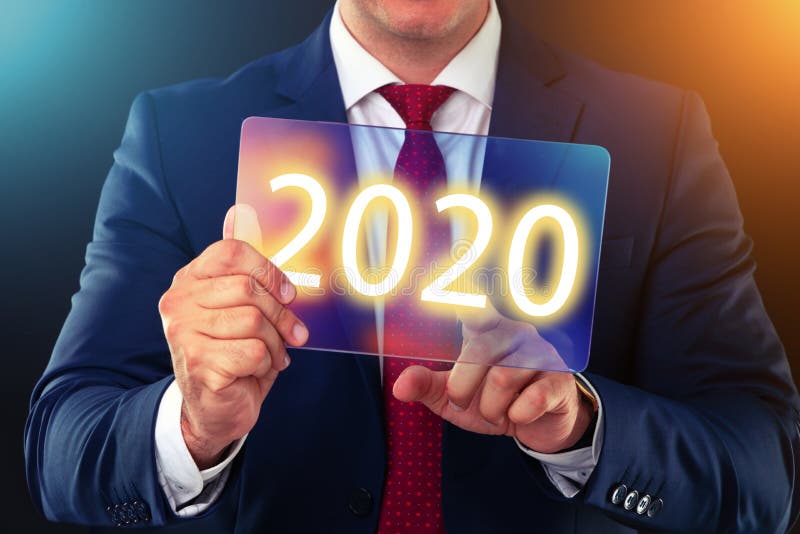 Businessman working with future technology screen, new year 2020 finance concept royalty free stock photography Businessman working with future technology screen, new year 2020 finance concept royalty free stock photography