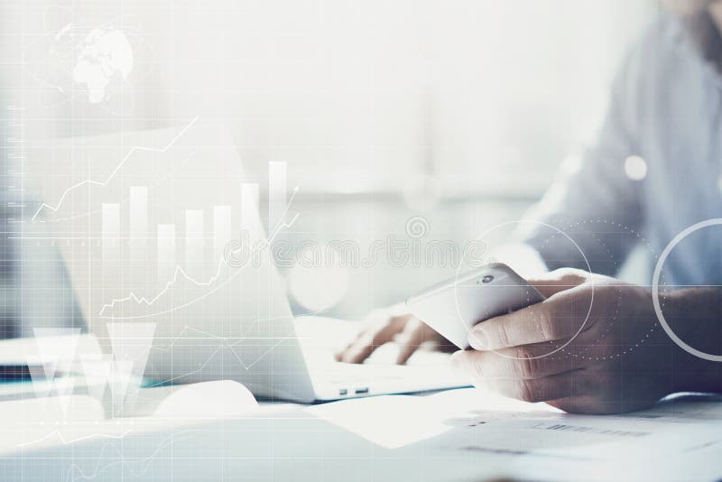 Businessman working with generic design notebook. Holding smartphone in hands. Worldwide connection technology interface stock photography Businessman working with generic design notebook. Holding smartphone in hands. Worldwide connection technology interface stock photography