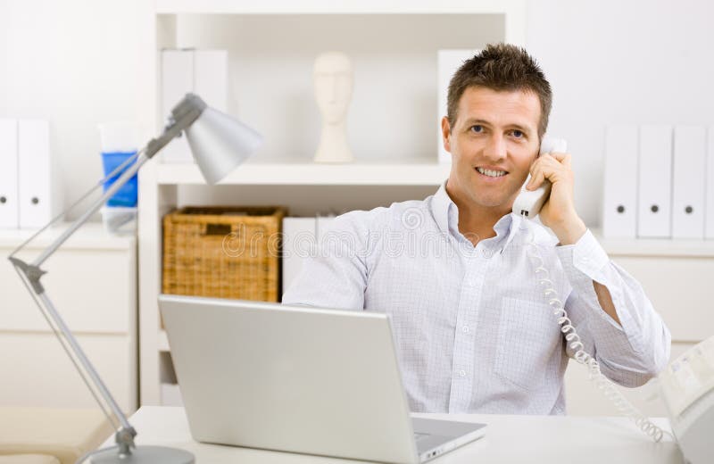 Businessman working at home stock image