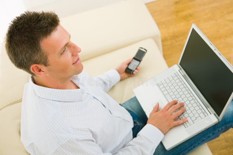 Businessman working at home stock image