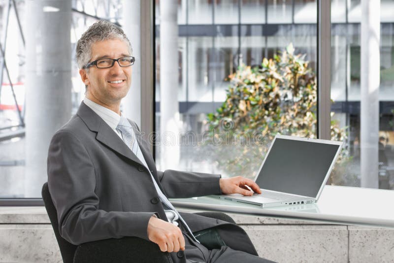 Businessman working on laptop