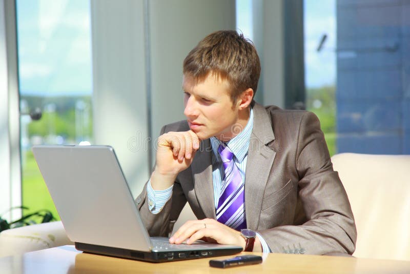 Businessman working on laptop