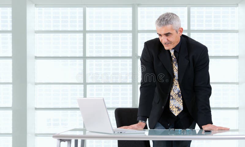 Businessman working on laptop stock photos
