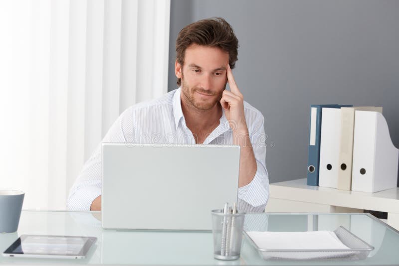 Businessman working at office stock photos