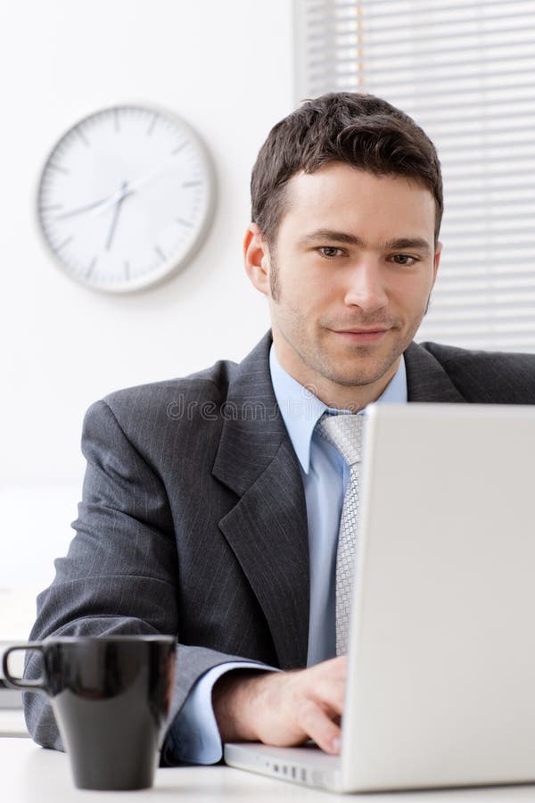 Businessman working at office stock photos