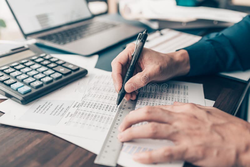 Businessman Working on Office Desk and Analyzing New Project of