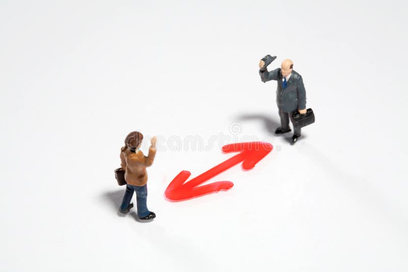 Businessmen greeting over a double-sided triangle royalty free stock image Businessmen greeting over a double-sided triangle royalty free stock image
