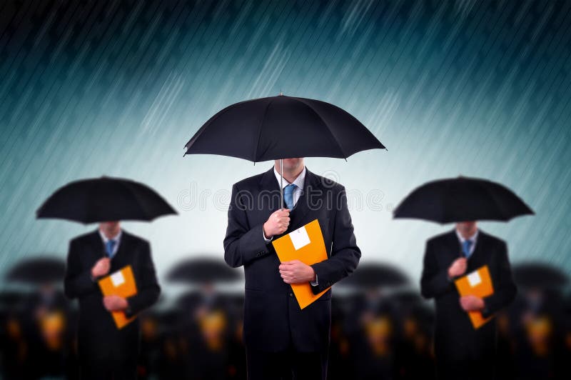 Businessmen with umbrella standing in stormy rain. Business team, insurance agents and consultants in business crisis situation. Businessmen with umbrella standing in stormy rain. Business team, insurance agents and consultants in business crisis situation.