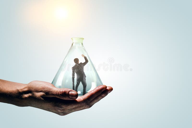 Businessmen scared inside glass bottle royalty free stock images
