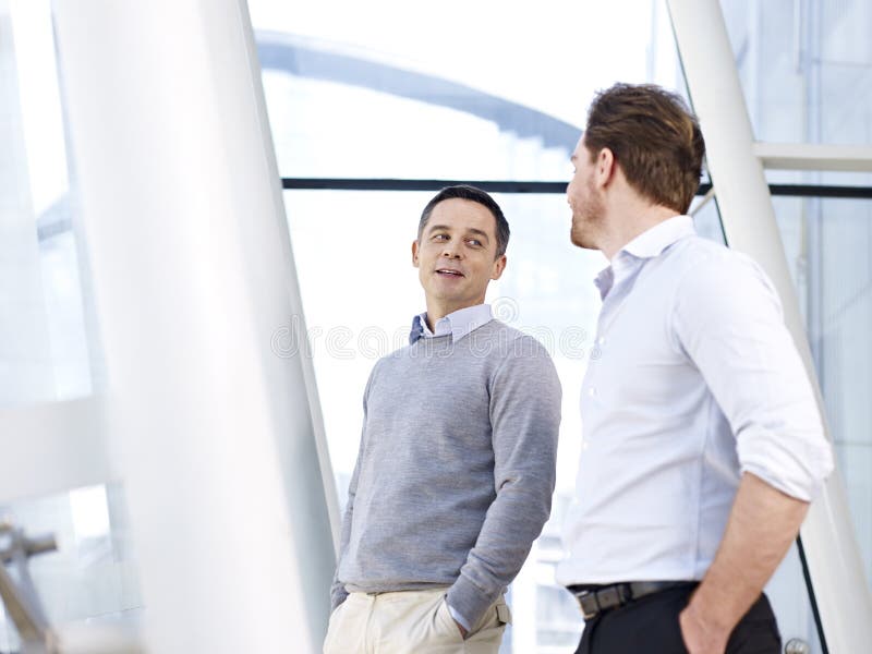 Businessmen talking royalty free stock photo Businessmen talking royalty free stock photo