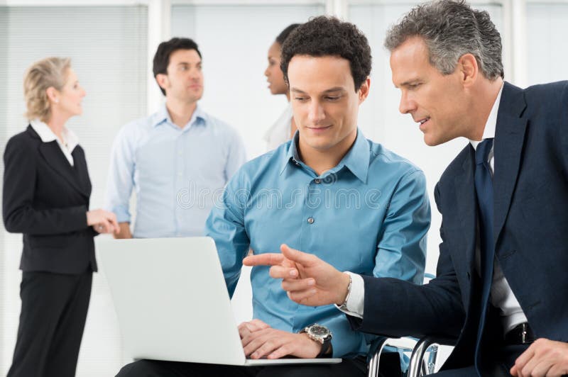 Young Architect Discussing Work with Boss Stock Image - Image of ...