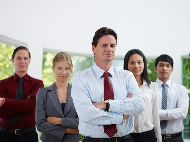 Businesspeople smiling and looking at camera royalty free stock photos Businesspeople smiling and looking at camera royalty free stock photos