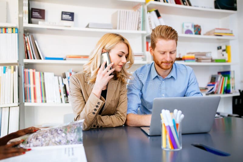 Businesspeople Working in Clean White Office Stock Photo Image of